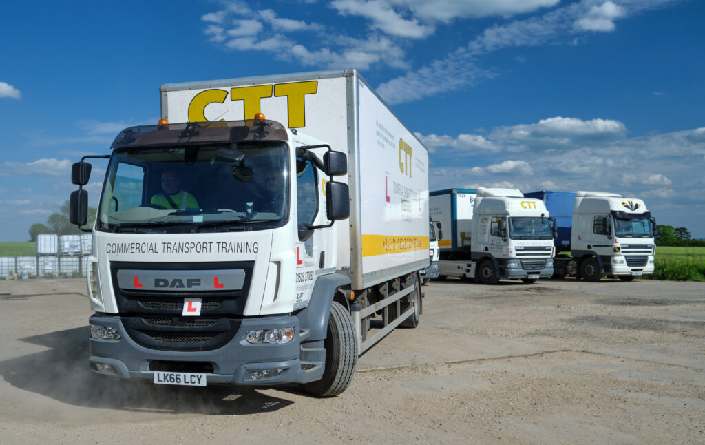 A picture of a commercial transport training lorry departing for a training session