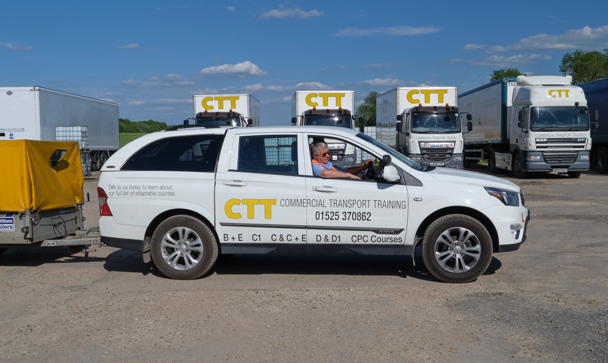 image of a worker driving a commercial transport training vehicle