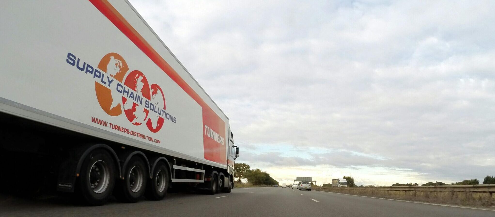 image of a van driving on the road